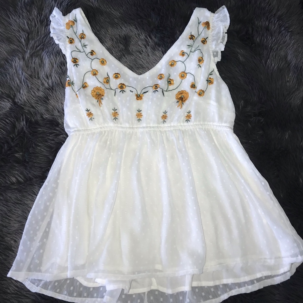 Francesca’s V-neck flowy floral top!